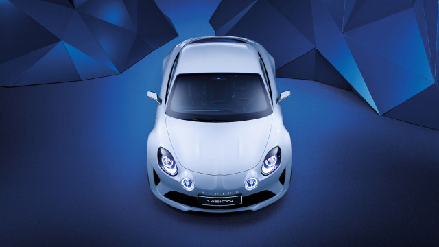 White sports car above blue free wallpaper for desktop - medium preview image