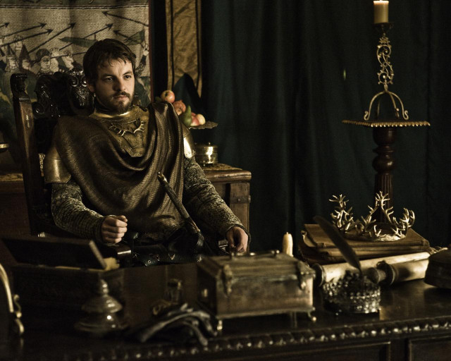 Medieval man sitting chair room free wallpaper for desktop - medium preview image