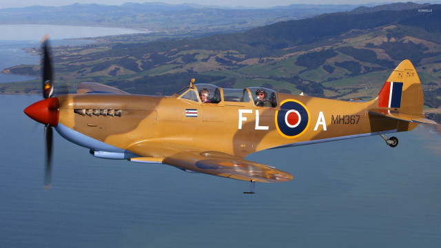 Yellow airplane flying water propeller free wallpaper for desktop - medium preview image