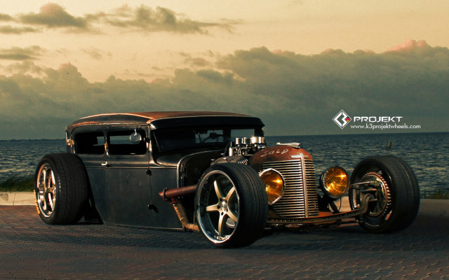 Classic car ocean road cloudy free wallpaper for desktop - medium preview image