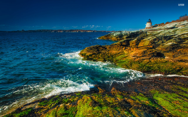 Lighthouse rocky cliff ocean green free wallpaper for desktop - medium preview image