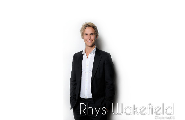 Man suit smiling white wall free wallpaper for desktop - medium preview image