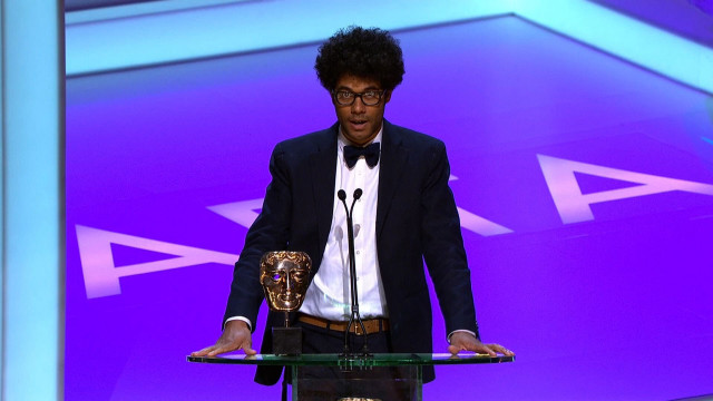 Man tuxedo bowtie trophy stage free wallpaper for desktop - medium preview image