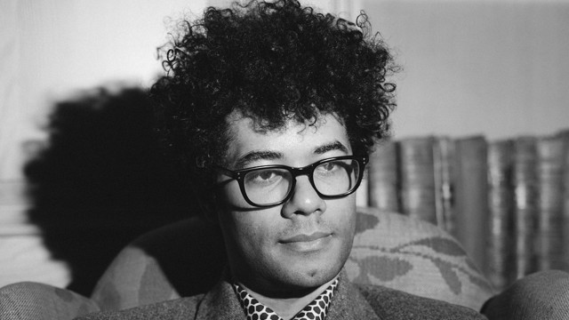 Man tie glasses couch room free wallpaper for desktop - medium preview image