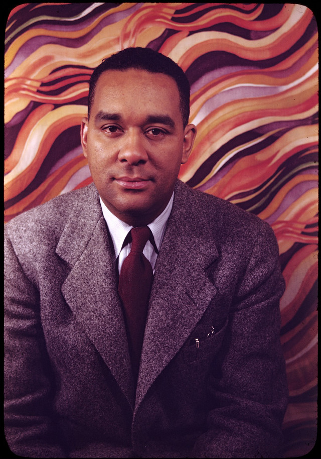 Man suit tie sitting colorful free wallpaper for mobile - medium preview image