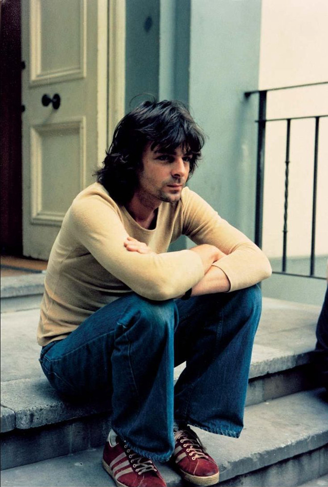 Man sitting steps house arms free wallpaper for mobile - medium preview image