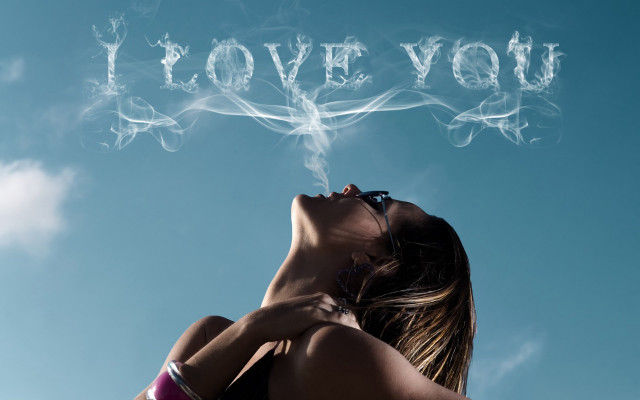 Woman blowing smoke i love free wallpaper for desktop - medium preview image