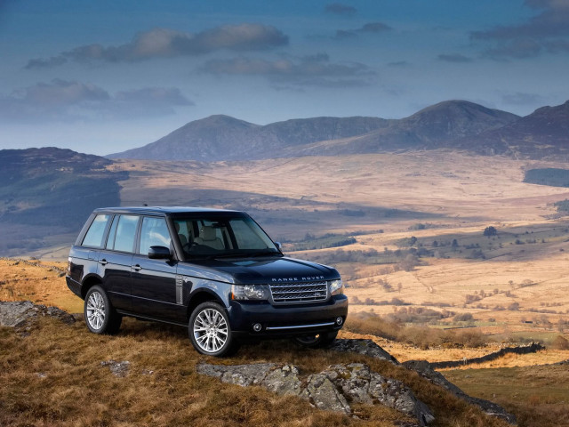 Black land rover parked hill free wallpaper for desktop - medium preview image