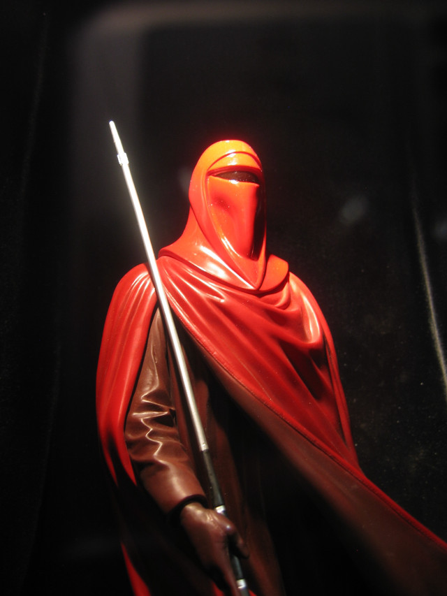 Statue man sword red cloak free wallpaper for mobile - medium preview image