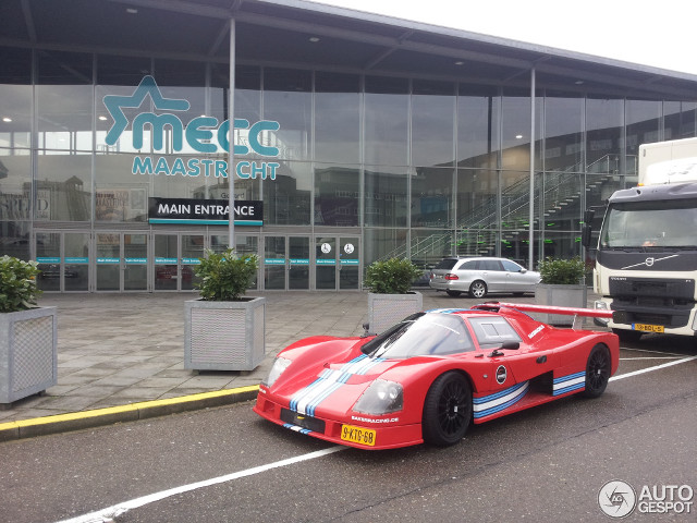 Red race car building bus free wallpaper for desktop - medium preview image