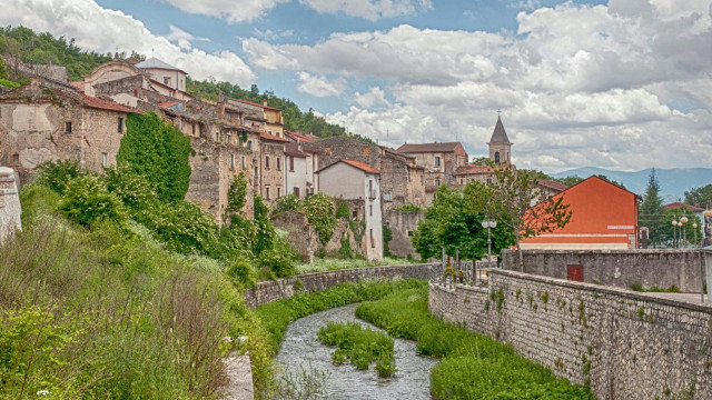 River lush hillside town tall free wallpaper for desktop - medium preview image