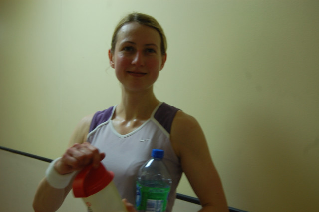 Woman holding water bottle red free wallpaper for desktop - medium preview image