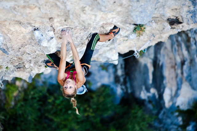 Woman climbing cliff rope helmet free wallpaper for desktop - medium preview image