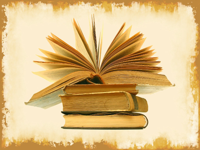 Pile of books on table free wallpaper for desktop - medium preview image