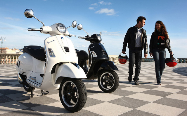 Man woman white scooter checkered free wallpaper for desktop - medium preview image