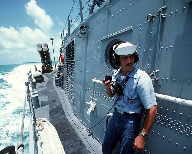 Sailor man boat ocean camera free wallpaper for desktop - medium preview image