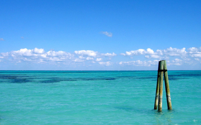 Wooden pole ocean water sky #2 free wallpaper for desktop - medium preview image