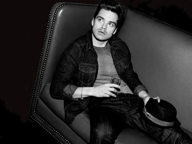 Man couch hat lap black free wallpaper for desktop - medium preview image