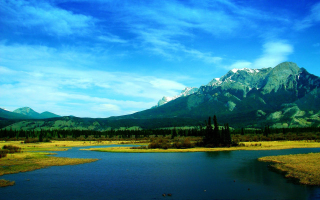 Lush green river mountains cloudy #2 free wallpaper for desktop - medium preview image