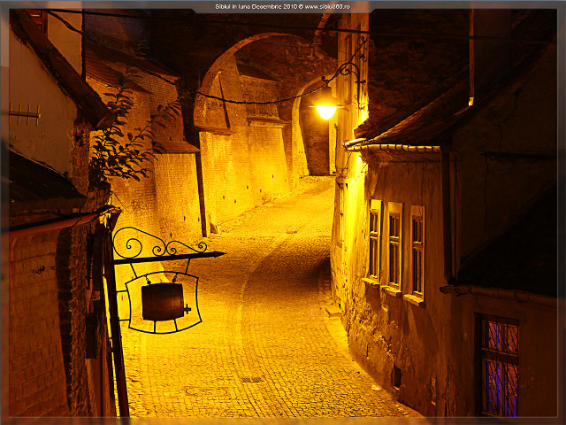 Narrow alley lamp night brick free wallpaper for desktop - medium preview image