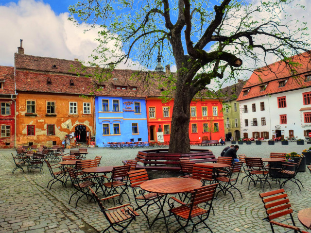 Courtyard tables chairs tree buildings free wallpaper for desktop - medium preview image