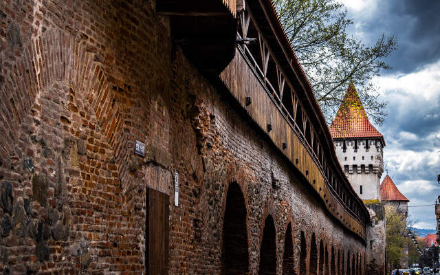Brick building clock tower cloudy free wallpaper for desktop - medium preview image