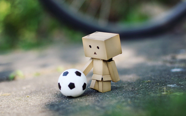Toy soccerball bike tiltshift blurry free wallpaper for desktop - medium preview image