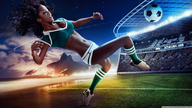 Woman kicking soccer ball grass free wallpaper for desktop - medium preview image