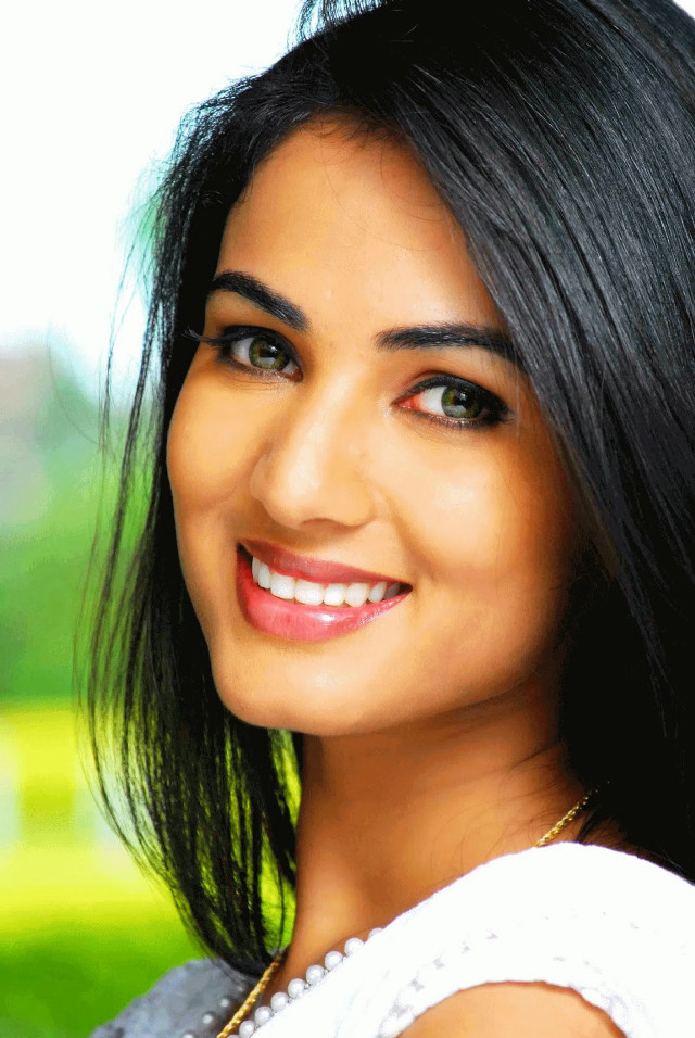 Woman smiling necklace green field free wallpaper for mobile - medium preview image