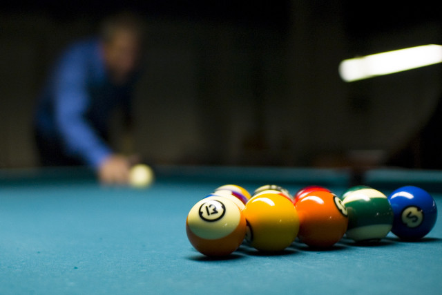 Pool table man playing pool free wallpaper for desktop - medium preview image