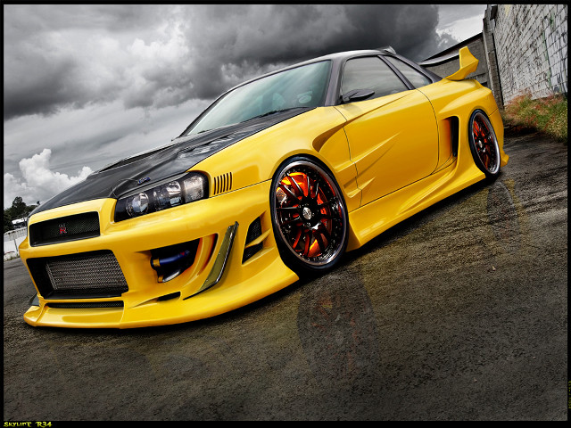 Yellow car parked street cloudy free wallpaper for desktop - medium preview image