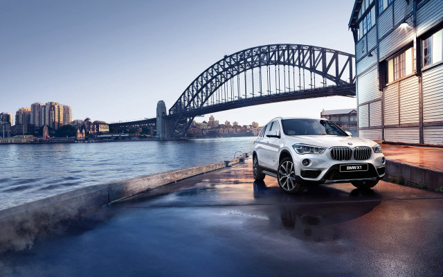 White bmw suv parked bridge free wallpaper for desktop - medium preview image