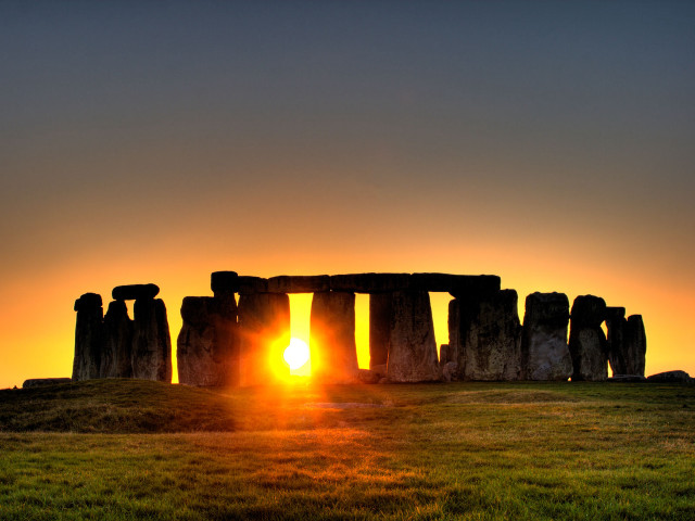 Sunset stonehenge grass field sky free wallpaper for desktop - medium preview image