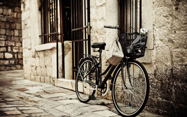 Bicycle parked building bags seat free wallpaper for desktop - medium preview image