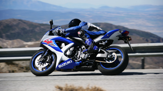 Motorcycle ride mountains hills background free wallpaper for desktop - medium preview image