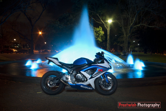 Motorcycle fountain night blue lights free wallpaper for desktop - medium preview image