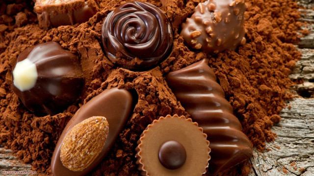 Chocolates dirt wooden table candle #3 free wallpaper for desktop - medium preview image