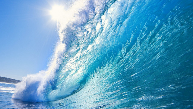 Large wave breaking ocean sunshine free wallpaper for desktop - medium preview image