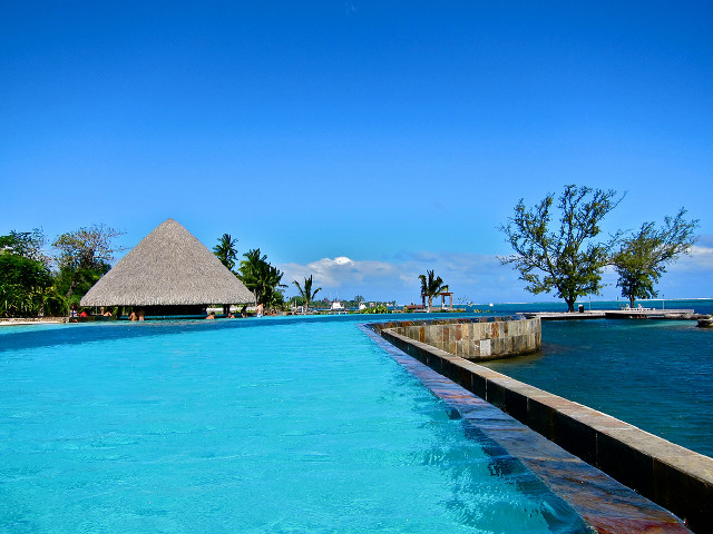 Large pool water feature thatched free wallpaper for desktop - medium preview image