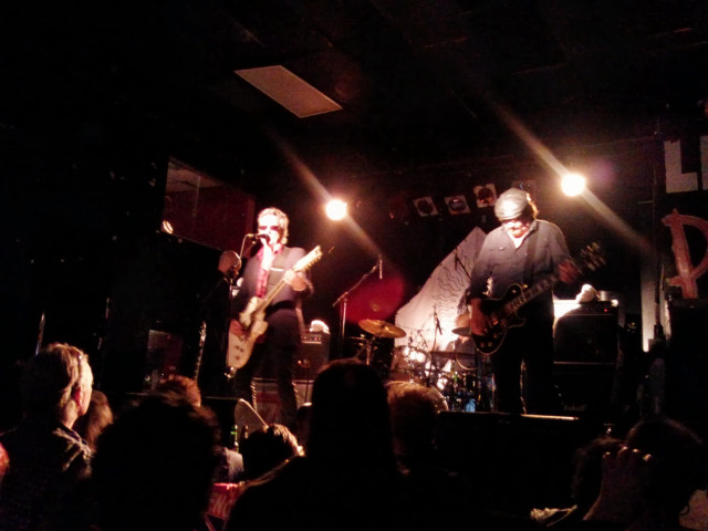 Stage performance band guitarists microphones free wallpaper for desktop - medium preview image