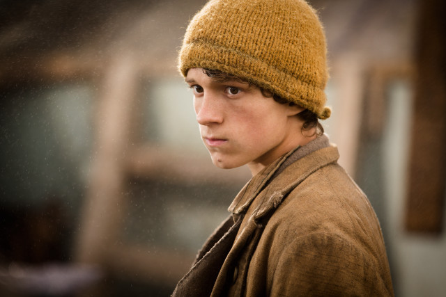 Young man brown hat serious free wallpaper for desktop - medium preview image