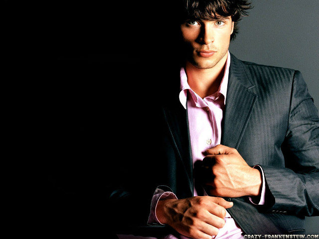 Man in suit holding tie #2 free wallpaper for desktop - medium preview image