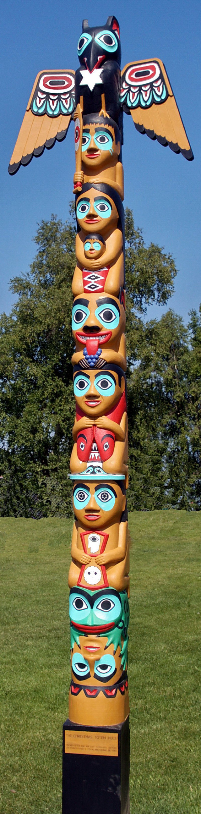 Tall sculpture bird colorful wings free wallpaper for mobile - medium preview image