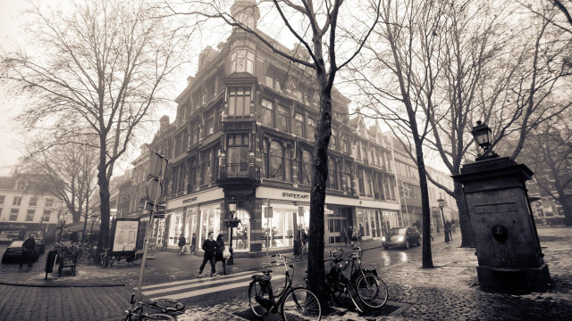 Black white building bicycles people free wallpaper for desktop - medium preview image