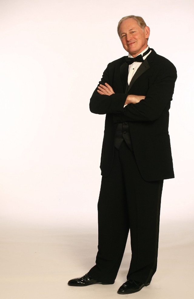 Man tuxedo posing arms crossed free wallpaper for mobile - medium preview image