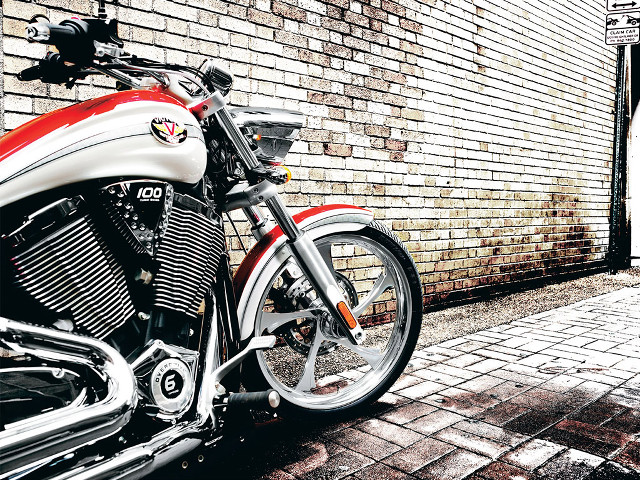 Red white motorcycle parked brick free wallpaper for desktop - medium preview image