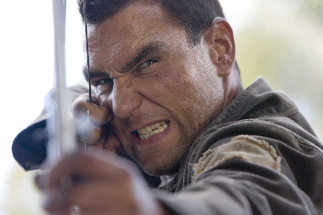 Man holding phone smiling camera free wallpaper for desktop - medium preview image