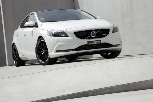 White volvo car parked building free wallpaper for desktop - medium preview image