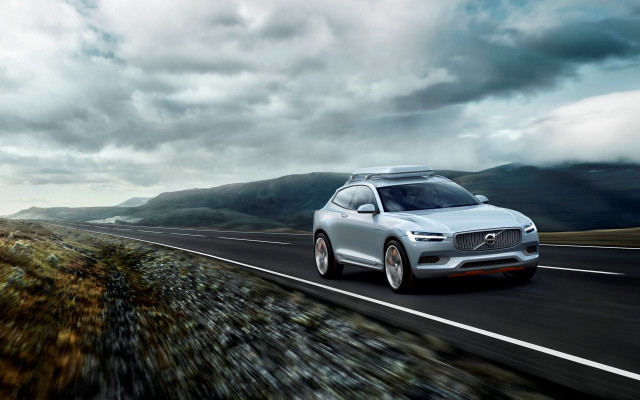 Silver volvo car driving mountains free wallpaper for desktop - medium preview image