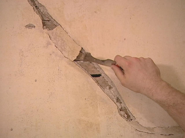 Man cutting hole wall plasterboard free wallpaper for desktop - medium preview image